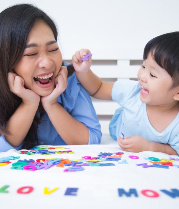 mother-daughter-studying-alphabet