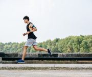 men-exercise-by-running-road-bridge