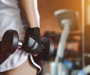 woman-lifting-dumbbells-gym