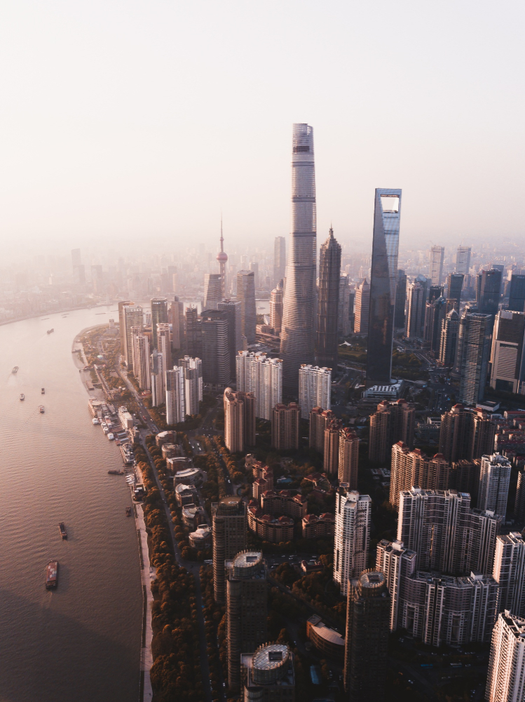 beautiful-overhead-shot-shanghai-city-skyline-with-tall-skyscrapers-river-side (1)